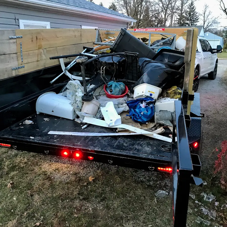 Roll-off dumpster delivered to a residential driveway in Big Lake